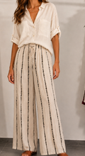 Pantalón estampado marrón